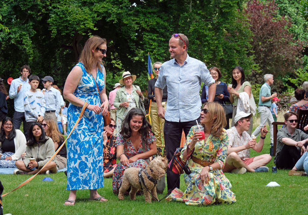 Guests chatting at the Garden Party