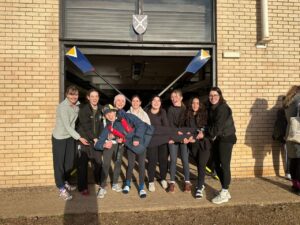 SHBC rowing team outside boathouse
